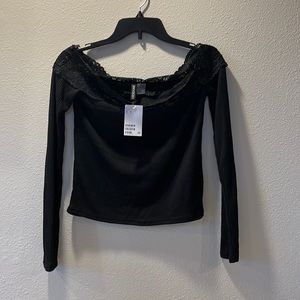 NWT Size small black off the shoulder long sleeve blouse with lace neckline.